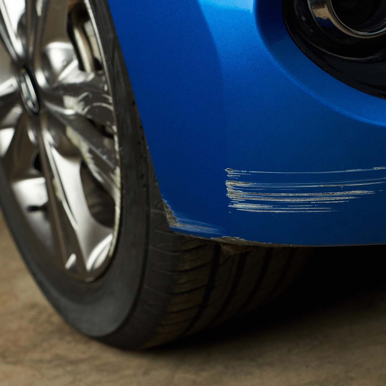 Dent car scratch close-up. Crashed car in accident