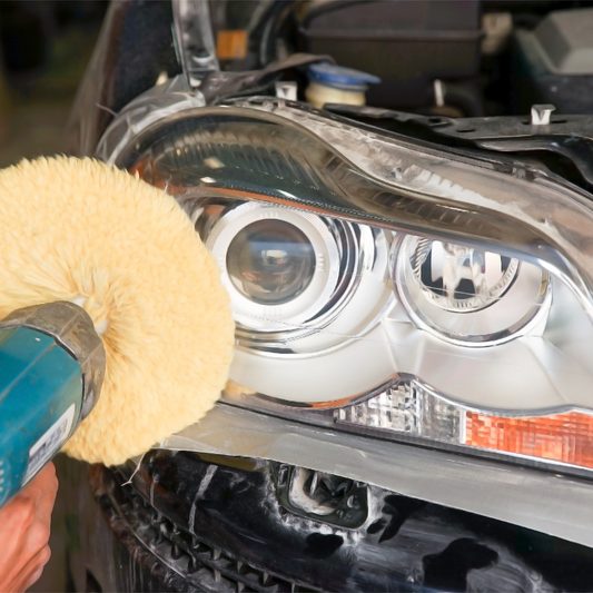 Headlight is polished by polish machine